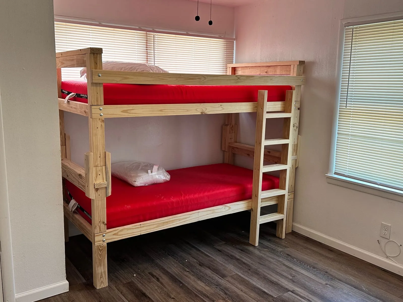 Finished Beds4Kids beds with bright red mattresses